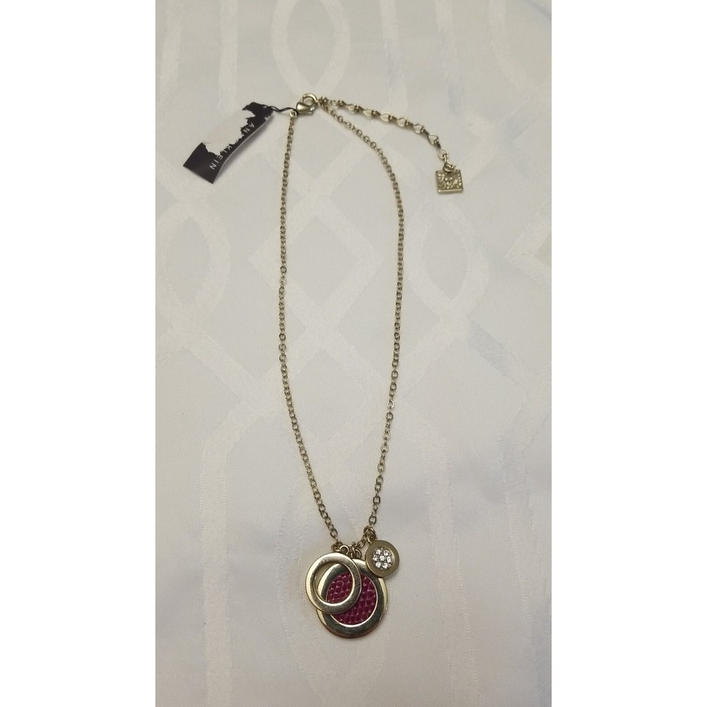 Anne Klein Women Gold Tone Layered Pendant Necklace Signed Lion Logo Rhinestone